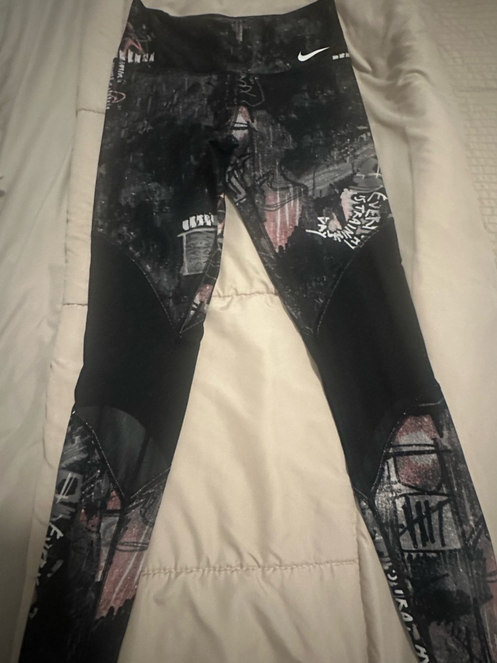 Nike Black and Pink Dri-FIT Graphic Leggings